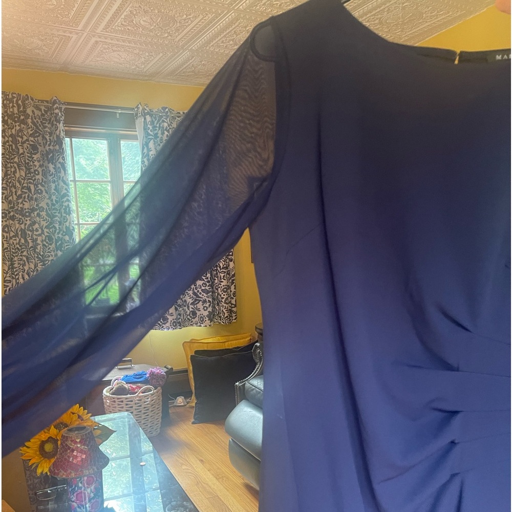 Navy blue dress with shear sleeves size 14. Cinched at the waist
